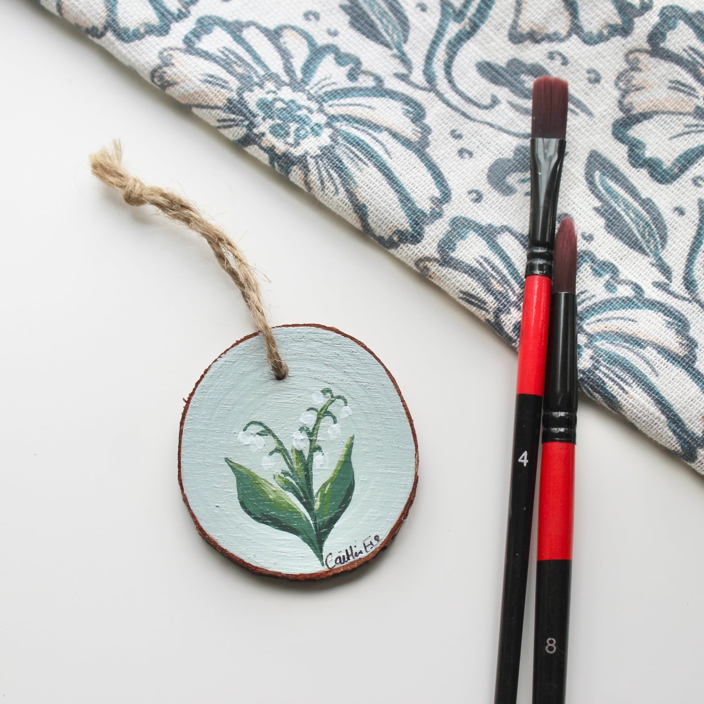 Hand-Painted Lily of the Valley Wood Slice with Twine, Original Floral Artwork, Rustic Home Decor, Unique Welsh decoration
