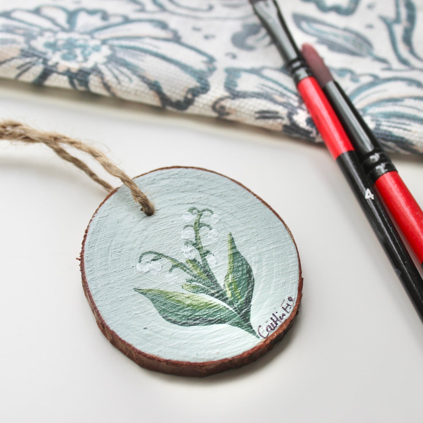Hand-Painted Lily of the Valley Wood Slice with Twine, Original Floral Artwork, Rustic Home Decor, Unique Welsh decoration