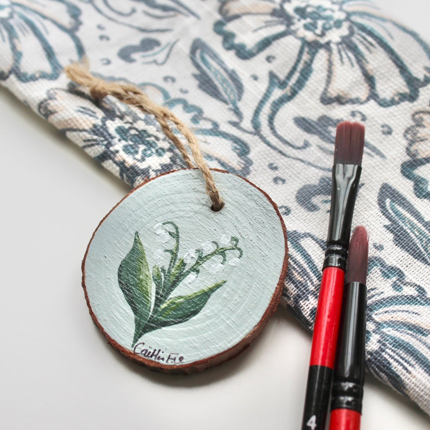 Hand-Painted Lily of the Valley Wood Slice with Twine, Original Floral Artwork, Rustic Home Decor, Unique Welsh decoration