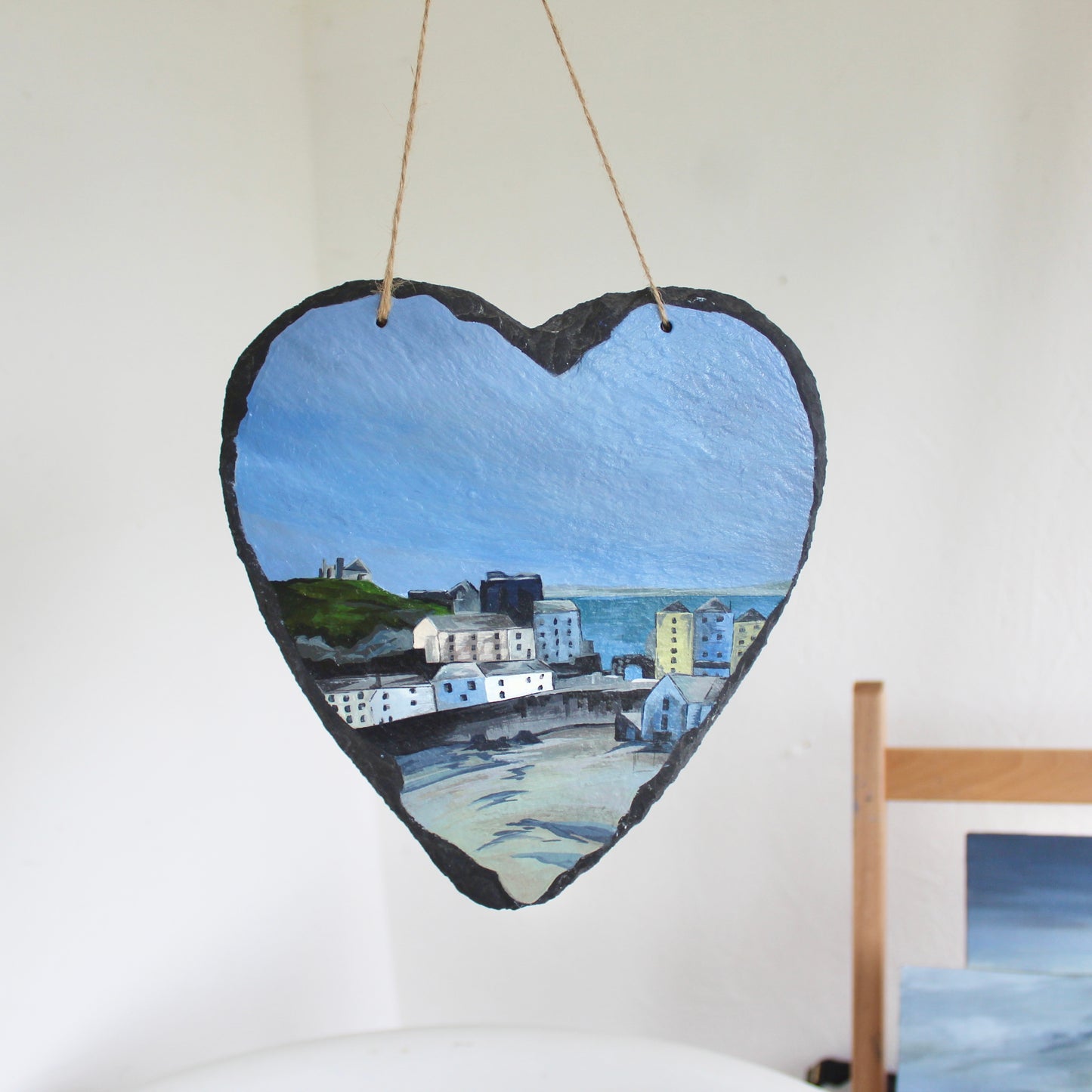 Tenby harbour painting on a decorative slate heart.