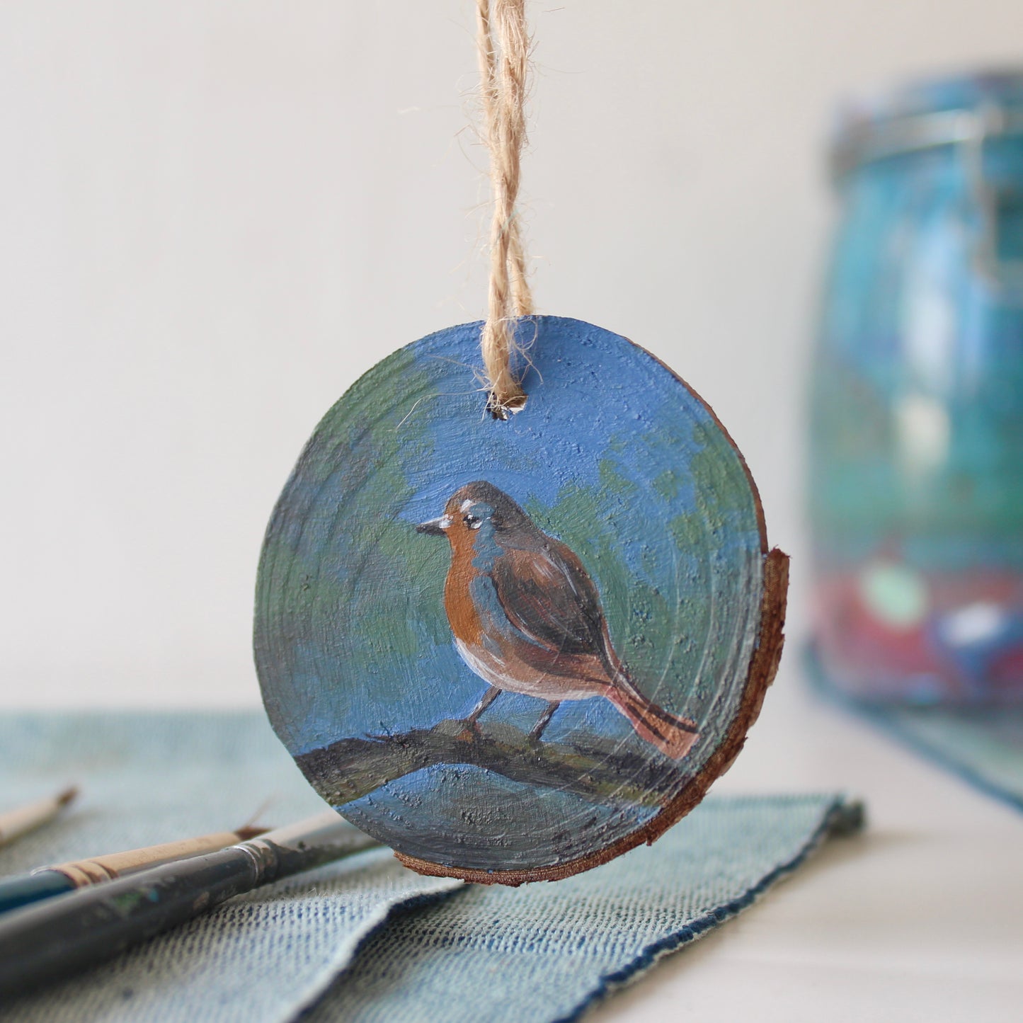 Charming Robin Christmas Ornament - Hand-Painted on Wood Slice.