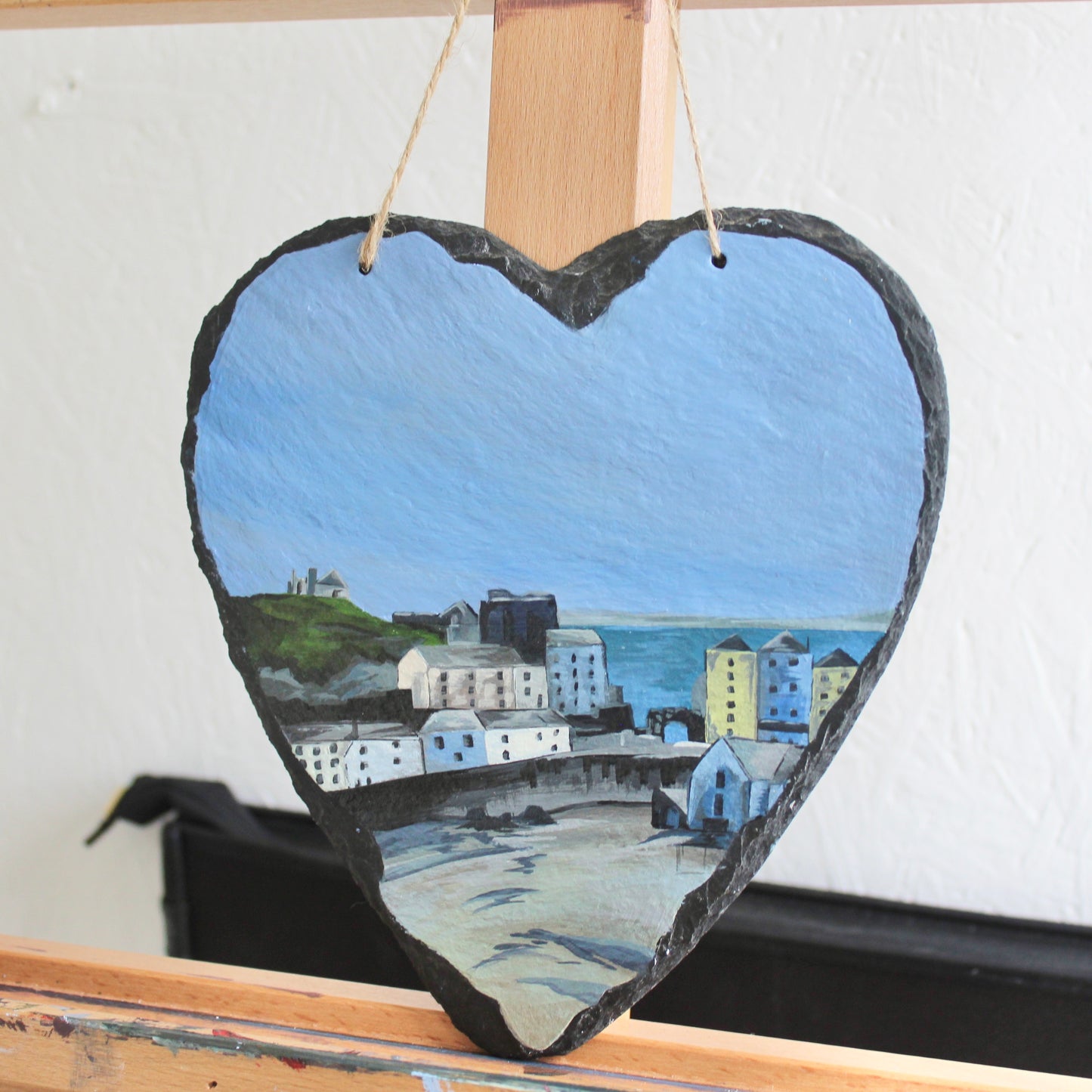 Tenby harbour painting on a decorative slate heart.