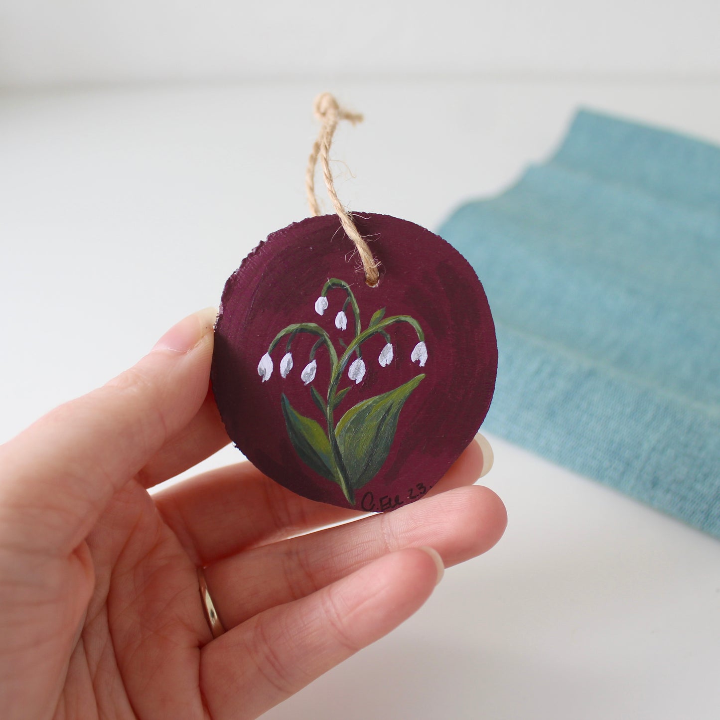 Rustic Wooden Lilly of the Valley Hanging Decor, a Winter Red Christmas Ornament, floral wood slice.