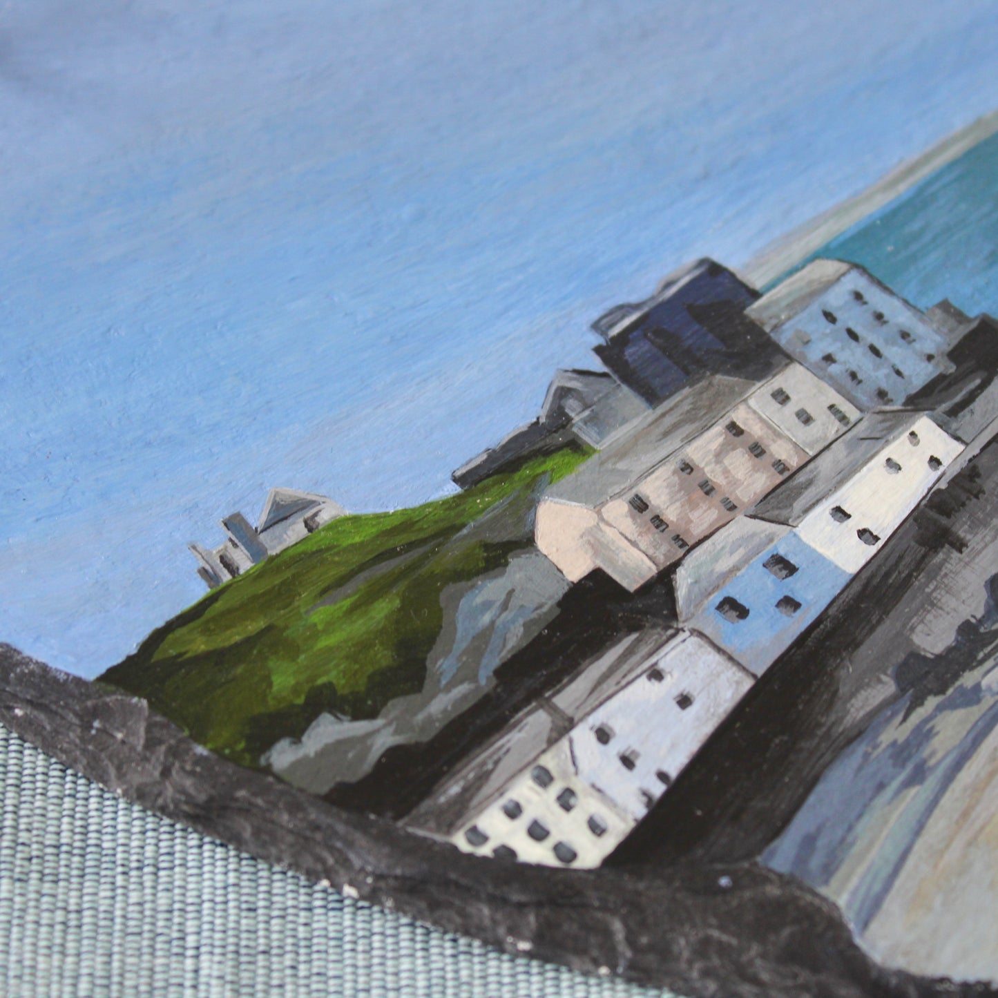 Tenby harbour painting on a decorative slate heart.