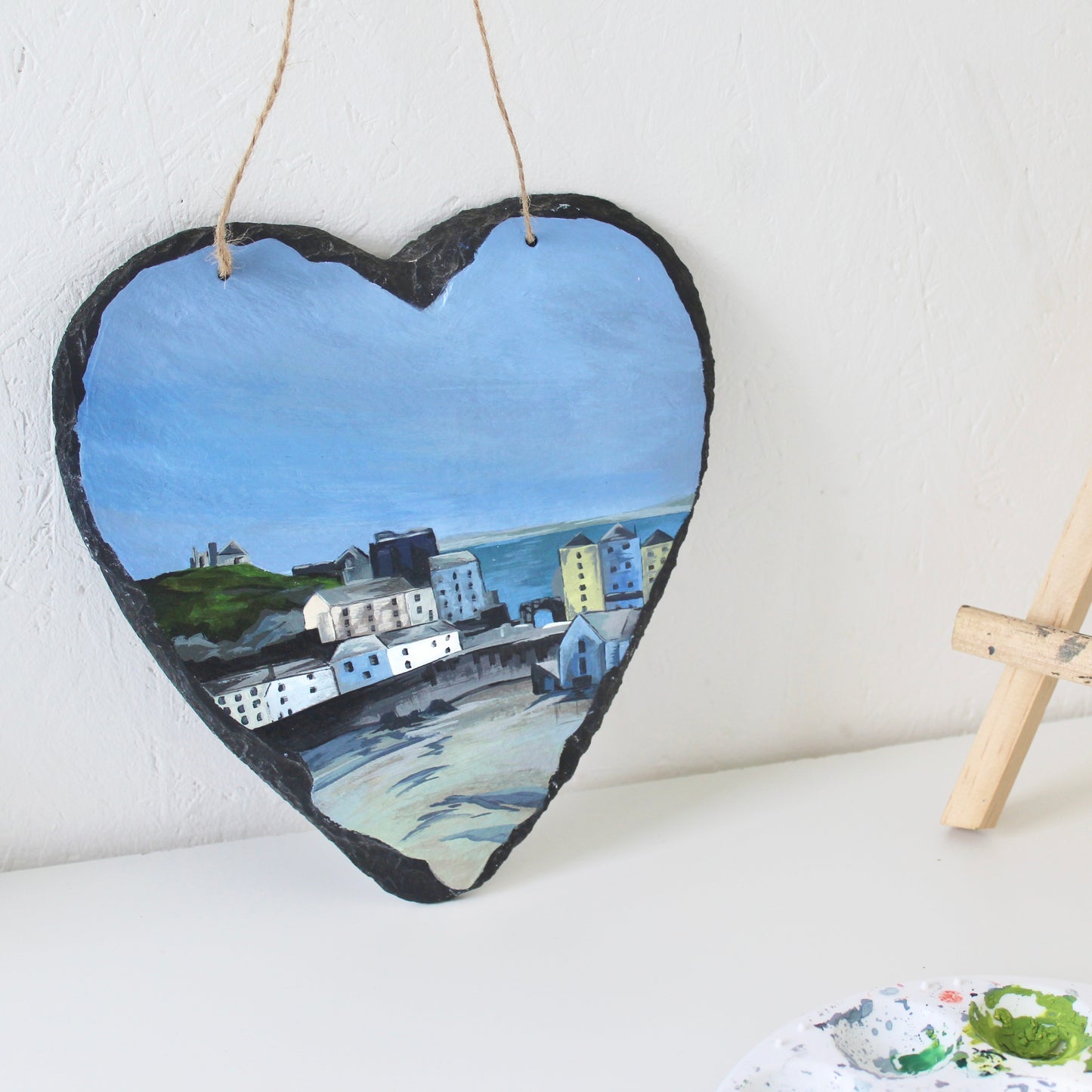 Tenby harbour painting on a decorative slate heart.