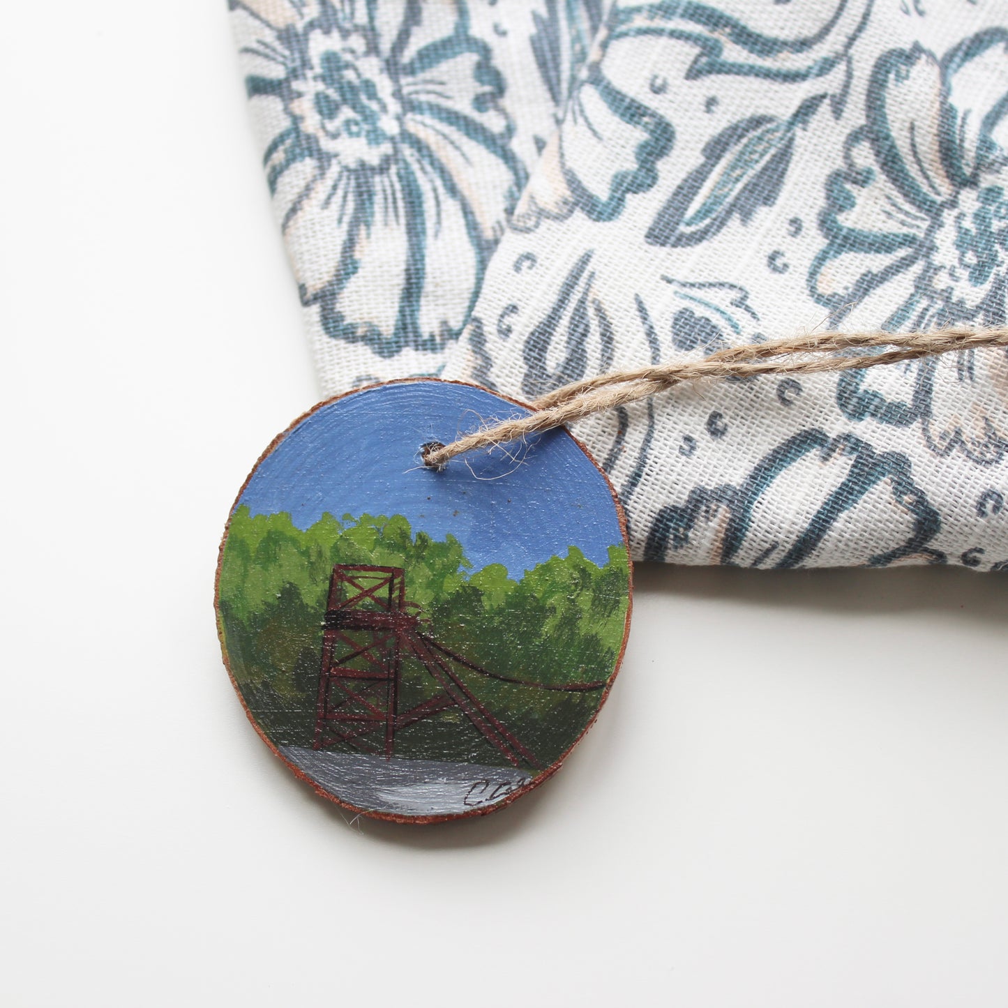 Hand-Painted Colliery Wheel on Rustic Wood Slice with Twine. Mining Art from Wales, Unique Welsh Gift